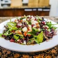 Goat Cheese Salad · Mesclun greens, dried cranberries, candied walnuts, tomatoes and cucumbers with goat cheese ...