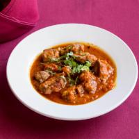 Lamb Boti · Boneless lamb pieces grilled in tandoor and cooked in a mild creamy tomato gravy.
