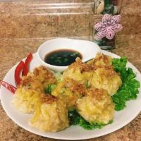A7. Chicken and Shrimp Shu Mai · Steamed or fried grounded chicken and shrimp wrapped in wonton skin served with sweet soy sa...