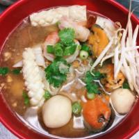 Nd4. Talay Tom Yum Noodle Soup Bowl · Mixed seafood. Thin rice noodle with bean sprout, scallion and grounded peanut served with f...