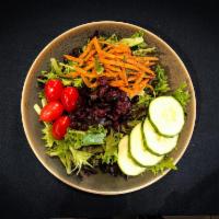 Side Salad · Romaine, tomato, cucumbers and carrots. Served with balsamic vinaigrette
