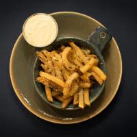 French Fries · Hand cut Idaho potatoes, roasted and flash fried, tossed with garlic, rosemary and parsley a...