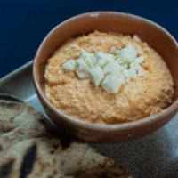Spicy Feta Dip · Feta cheese blended with florina peppers, garlic, olive oil and a pinch of red pepper flakes...