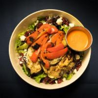 Pita Grill Salad · Mixed greens, dried cranberries, pita croutons, feta, fire roasted vegetables, Red pepper vi...