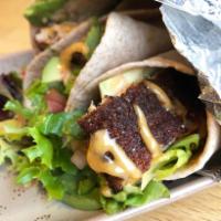 Blackened Mahi Mahi Tacos · Blackened Mahi Mahi, pico de gallo, shredded lettuce, avocado and Santa Fe sauce. Served wit...