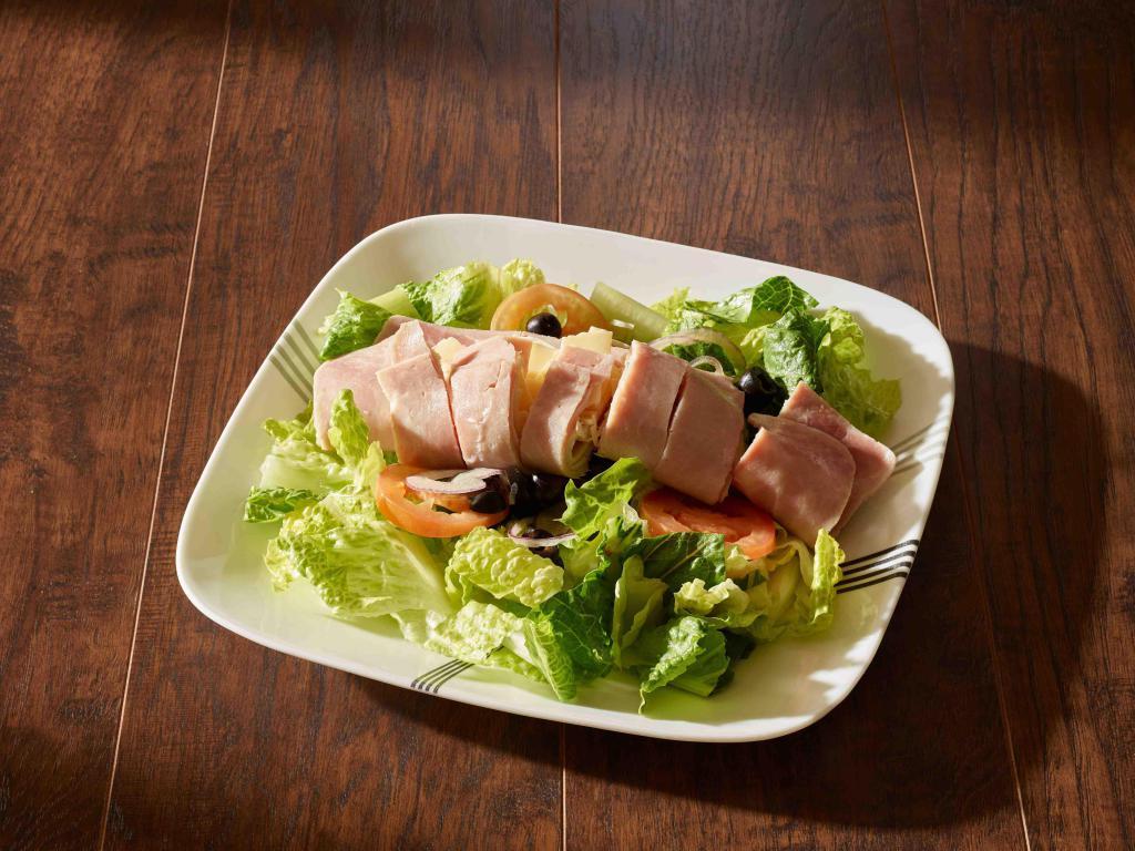 Chef Salad · Turkey, ham, Swiss, tomato, romaine, olives, onion, dressing choice.