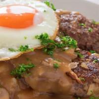 Loco Moco · White rice, topped with a hamburger patty, a fried egg and brown gravy.