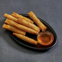 1. Egg Roll · Lightly fried spring roll wraps filed with glass noodles, taro, cabbage, celery, carrots and...