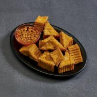 4. Fried Tofu · Lightly fried tofu served with a side of sweet and sour sauce topped with ground peanuts. 