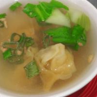 19. Wonton Soup · Wontons stuffed with ground chicken and shrimp in chicken broth with bok choy. Topped with g...