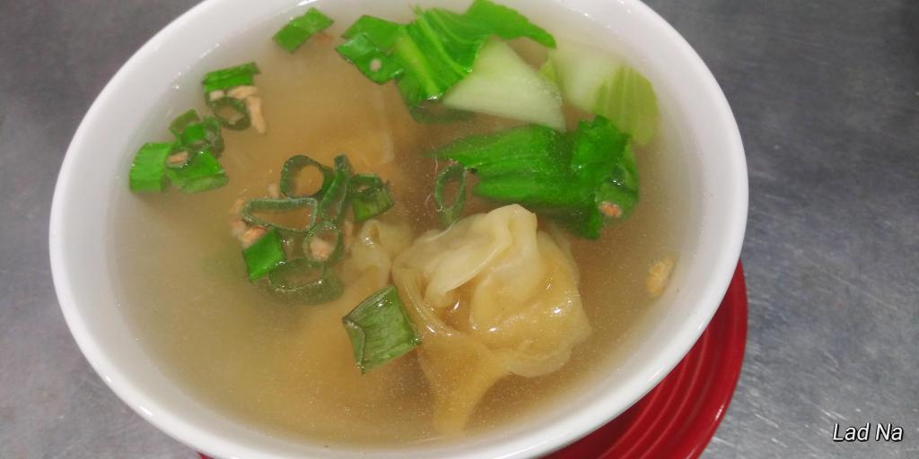 19. Wonton Soup · Wontons stuffed with ground chicken and shrimp in chicken broth with bok choy. Topped with green onions & cilantro.