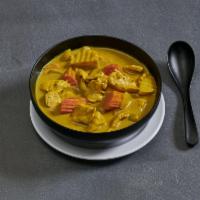 38. Yellow Curry with Chicken · Potatoes, carrots, onions and yellow curry paste simmered in coconut milk. Spicy. 