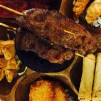 A13. Pu Pu Platter · For 2. Includes egg roll, beef on a stick, spare ribs, crabmeat cheese wonton, fantail shrim...