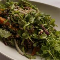 Quinoa Salad · High in protein quinoa salad tossed with sweet potatoes, red onions, Gorgonzola, candied wal...
