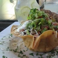Santa Fe Salad · A flour tortilla shell stuffed with Natural Boneless Chicken Breast, our famous black beans,...