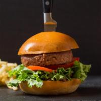 Vegetarian Cheese Burger · Veggie patty made with white cheddar cheese, tomatoes, onions, lettuce and roasted garlic ai...