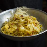 Carbonara Pasta · With pancetta very light white homemade-style sauce, garlic, Parmesan, parsley, egg yolk and...