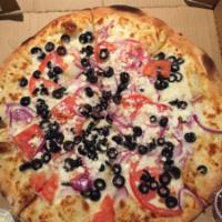 Greek Pizza · White garlic sauce, mozzarella cheese, feta cheese, tomatoes, onions and black olives.