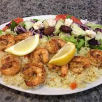 Shrimp Kebab Platter · Served with choice of side, pita, salad and tzatziki.