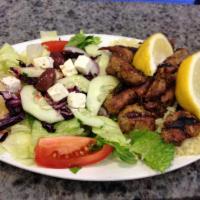 Souvlaki Platter · Served with choice of side, pita, salad and tzatziki.