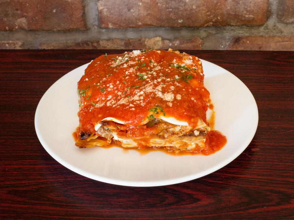 Lasagna · Homemade lasagna made with beef, ricotta, and mozzarella cheese.