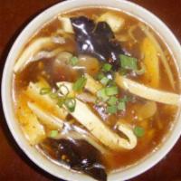 Hot and Sour Soup · Served with egg tofu, mushrooms and bamboo shoot etc.