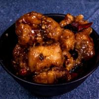 28a. Orange Chicken · Golden brown and crispy with lemon sauce. Served with steam rice or fried rice. Spicy.