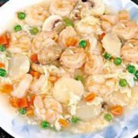 59. Shrimp with Lobster Sauce · Mushrooms, peas, carrots, baby corn and egg white sauce.