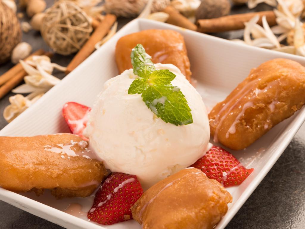 Coco Pudding · Silky coconut pudding deep fried and served with coconut ice cream.