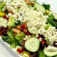 Greek Salad · Fresh romaine lettuce, cucumber, tomato, red onion, feta cheese, Kalamata olives and red and...