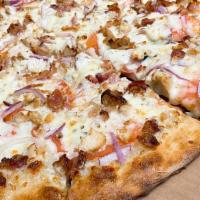 Garlic Chicken Ranch Pizza · Garlic, chicken,cilantro, red onions and sun-dried tomatoes.