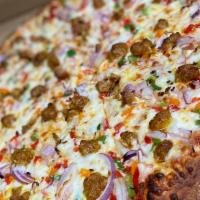 Peppers and Italian Sausage Pizza · Red, green and yellow peppers, spicy homemade Italian sausage and red onions.