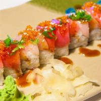 Tokyo Roll · Inside: unagi, cucumber and avocado. Outside: tuna, hamachi unagi sauce, tobiko and green on...