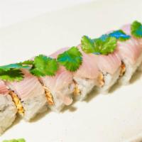 Baja Hamachi Roll · Inside: spicy tuna and cucumber. Outside: topped with hamachi, lemon juice, cilantro with ho...
