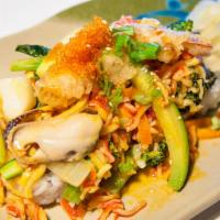 Dynamite Roll · Inside: shrimp tempura, crabmeat and cucumber. Outside: scallop, crabmussel, shrimp, veggie,...