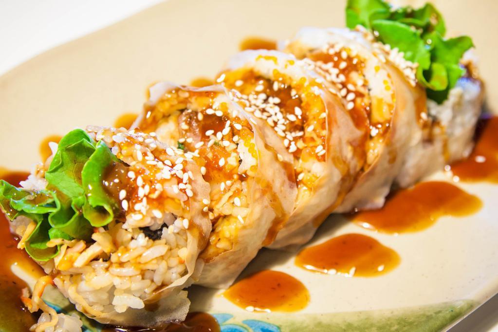 Bonanza Roll · Inside: shrimp tempura, imitation crab and cucumber. Outside: soy wrap.