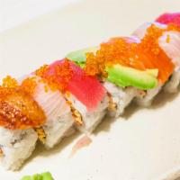 Rainbow Roll · Tuna, salmon, tai, eel, cucumber, avocado, imitation crab and tobiko.