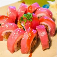 Cherry Blossom Roll · Inside: spicy tuna and shrimp tempura with cucumber. Outside: freshly sliced tuna covers the...