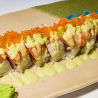 Namasake Roll · Inside: salmon, cream cheese and avocado. Outside: salmon, sliced lemon, wasabi sauce and to...