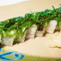 Godzilla Roll · Inside: spicy tuna. Outside: seaweed salad.