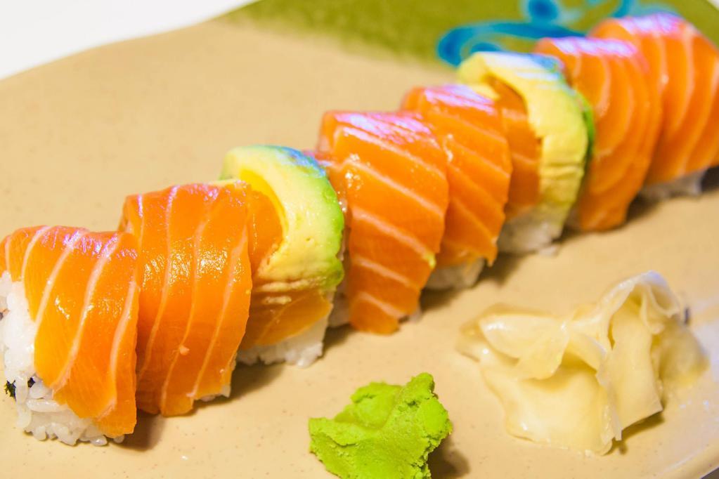Golden Salmon Roll · Inside: cucumber and salmon tempura. Outside: Avocado and salmon.