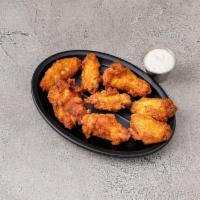 Buffalo Wings · 8 wings. Mild or hot with bleu cheese dressing on the side.