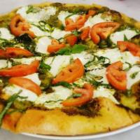 Pesto Margherita · Fresh mozzarella, sliced tomatoes and fresh basil pesto