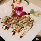 V08. Nemo Roll · Spicy crab, shrimp tempura top with crunch flake and eel sauce. Spicy. 