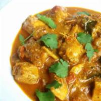 Chicken Curry · Chicken breasts cooked in a tomato sauce with potatoes, onions, green peppers and curry spic...