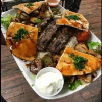 Lebanese Meat Combo for 2 · A combination platter with 2 lamb kabobs, 2 chicken kabobs and 3 kafta kabobs. Includes hous...