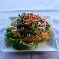 Beef Salad on Crispy Noodle · Thin-sliced beef, bean sprouts, jalapeno, bell pepper, cilantro, cabbage, carrots, scallions...