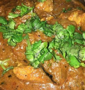 Chennai Chicken Curry · Boneless chicken simmered in a tomato and onion gravy with a blend of aromatic spices. Served with rice.