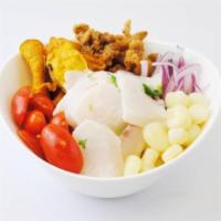 Ceviche Poke · White fish ceviche, crispy calamari, cilantro, red onions, Peruvian corn, cherry tomatoes, a...