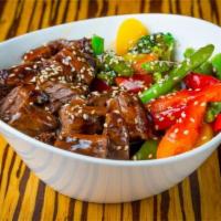 Beef Teriyaki Bowl · Grilled Beef served with Teriyaki sauce, sesame seeds, steamed veggies and white rice, or br...